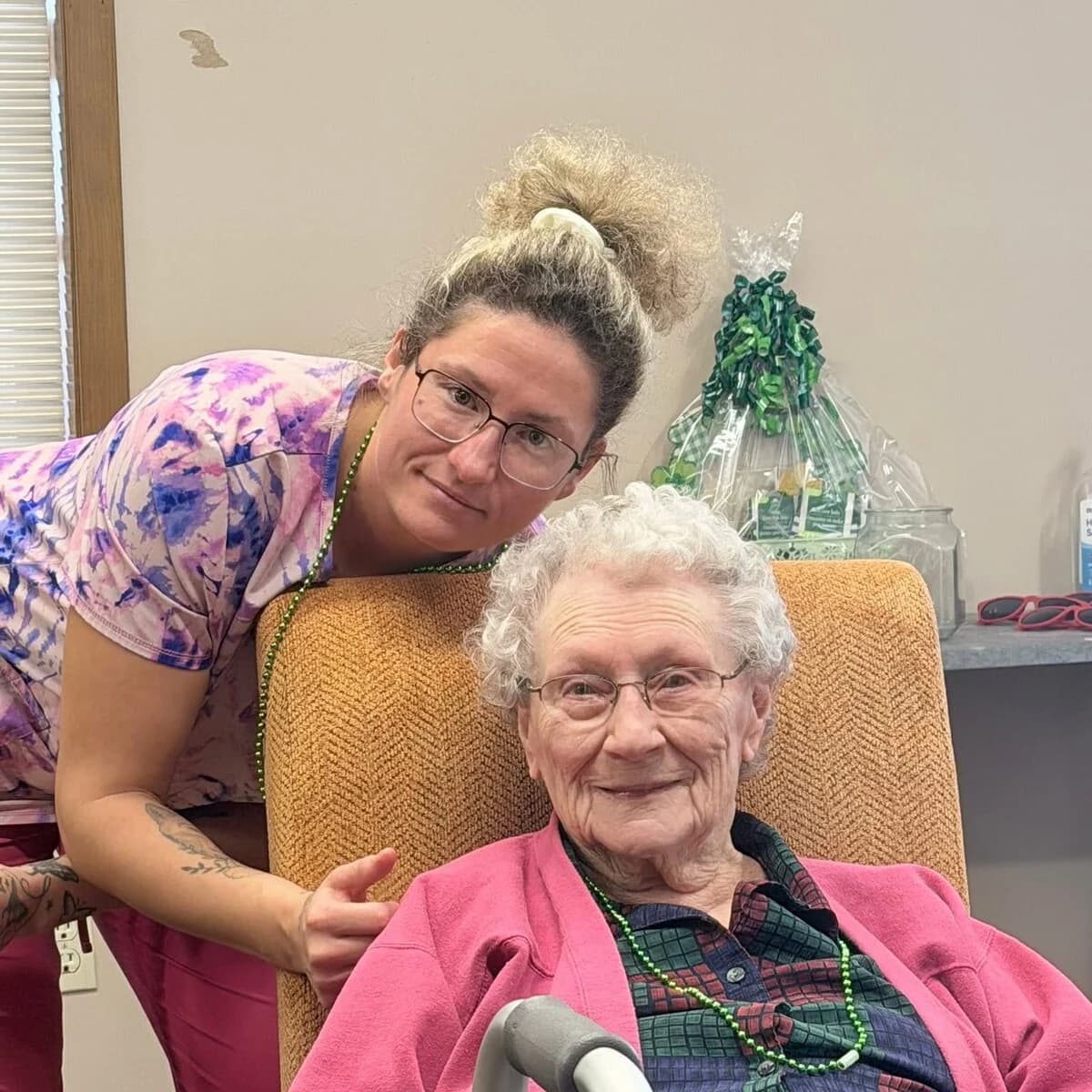 Allheart caregiver supporting an older adult at home.